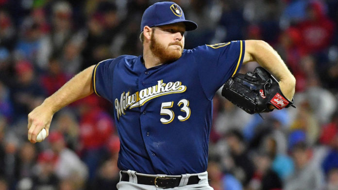 Brandon Woodruff takes the mound for the Milwaukee Brewers